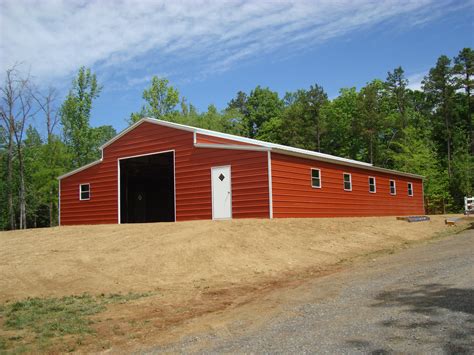 Tin barn - Secure, long-lasting, low maintenance, and strong, our metal barn kits for sale are a perfect choice. If you’re looking for a cost-effective and secure metal barn kit, steel barns from Boss Buildings are the best. Contact us today at (336) 673-3065 to find out more and choose the best one for you. Get Your Price (336) 673-3065. 